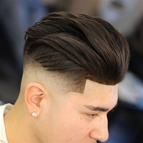 fade with longer hair|long hair high fade haircut.